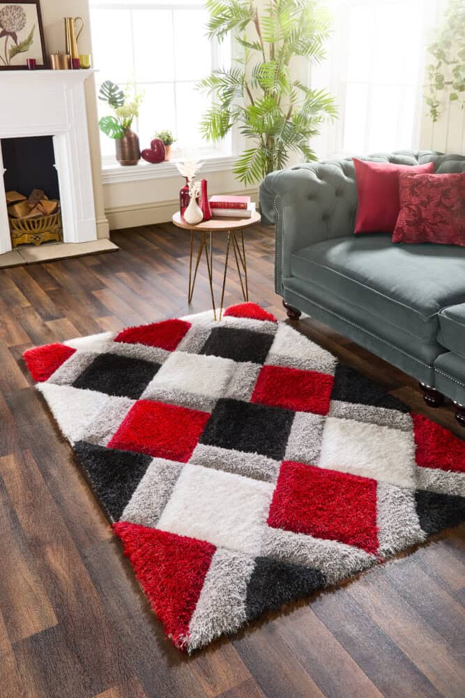 Red, black, and white Geo 3D shaggy rug in living room setting.