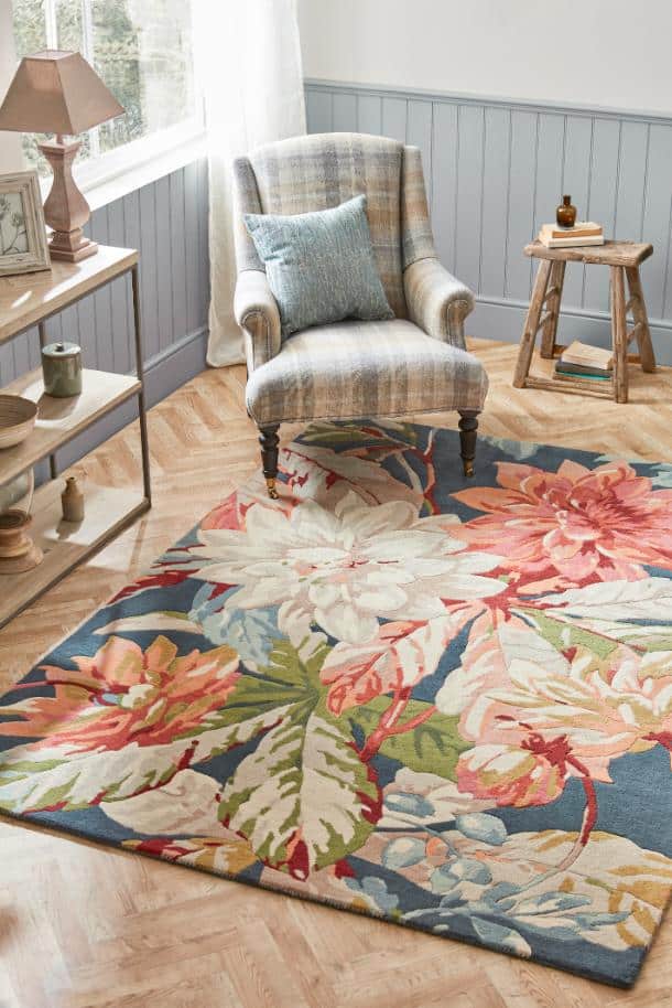 Elegant floral rug in teal with dahila and rosehip design from Stringers Home.