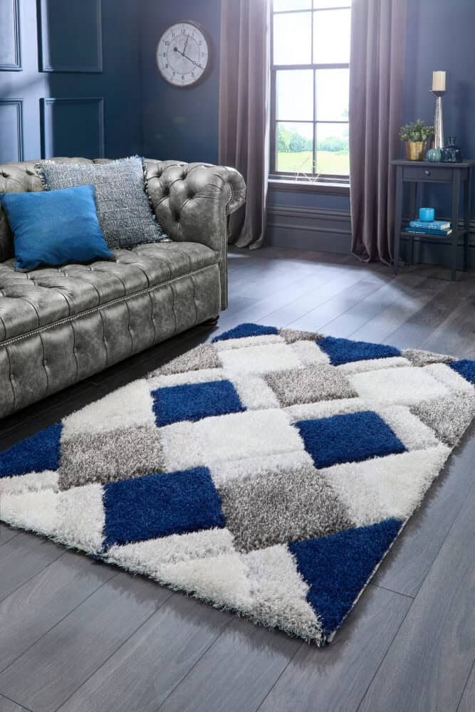 Geo 3D Shaggy Rug Navy with textured pattern in modern living room.