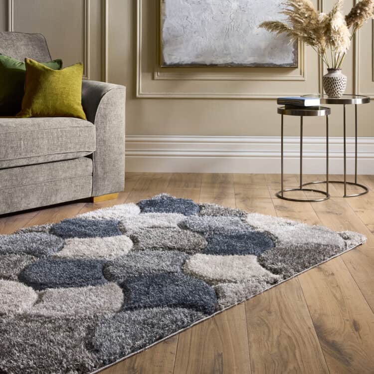 Navy scallop 3D shaggy rug in modern living room setting.