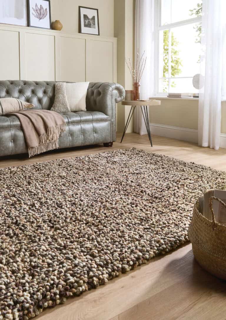 Natural rocks shaggy rug in a bright living room setting.