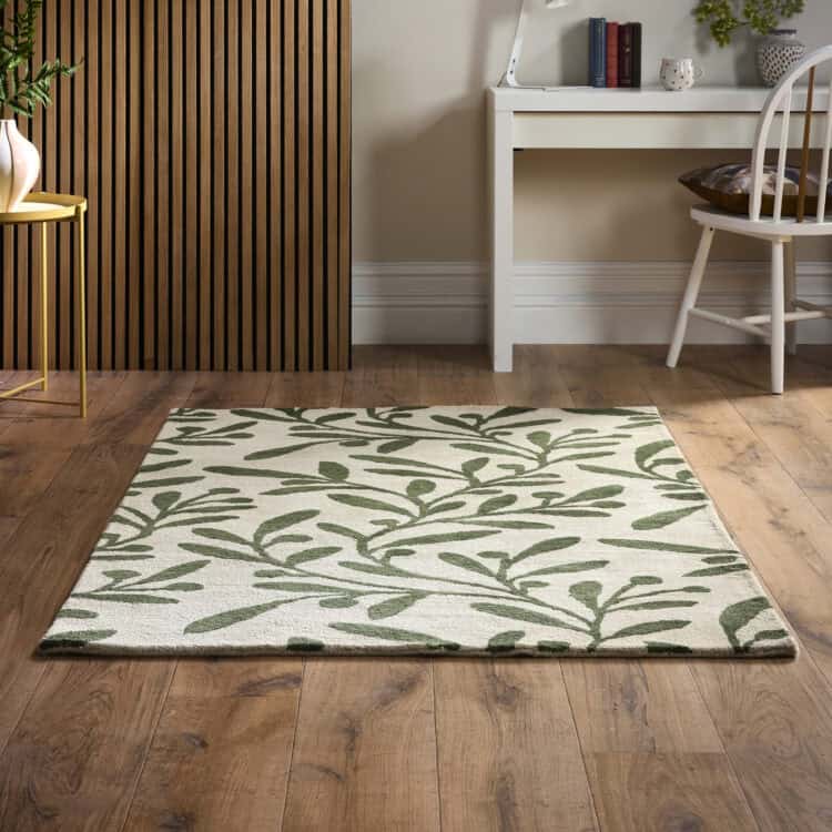 Elegant trailing leaf patterned rug in a modern living space.