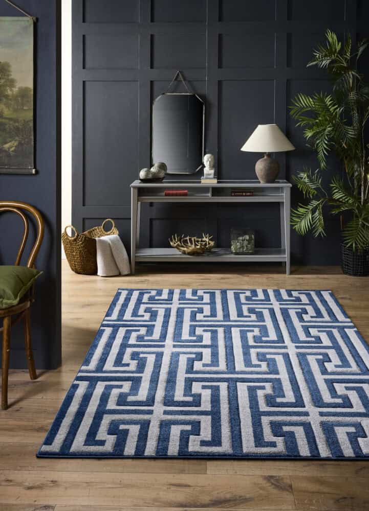 Modern Greek key rug in beige and cream with geometric pattern.